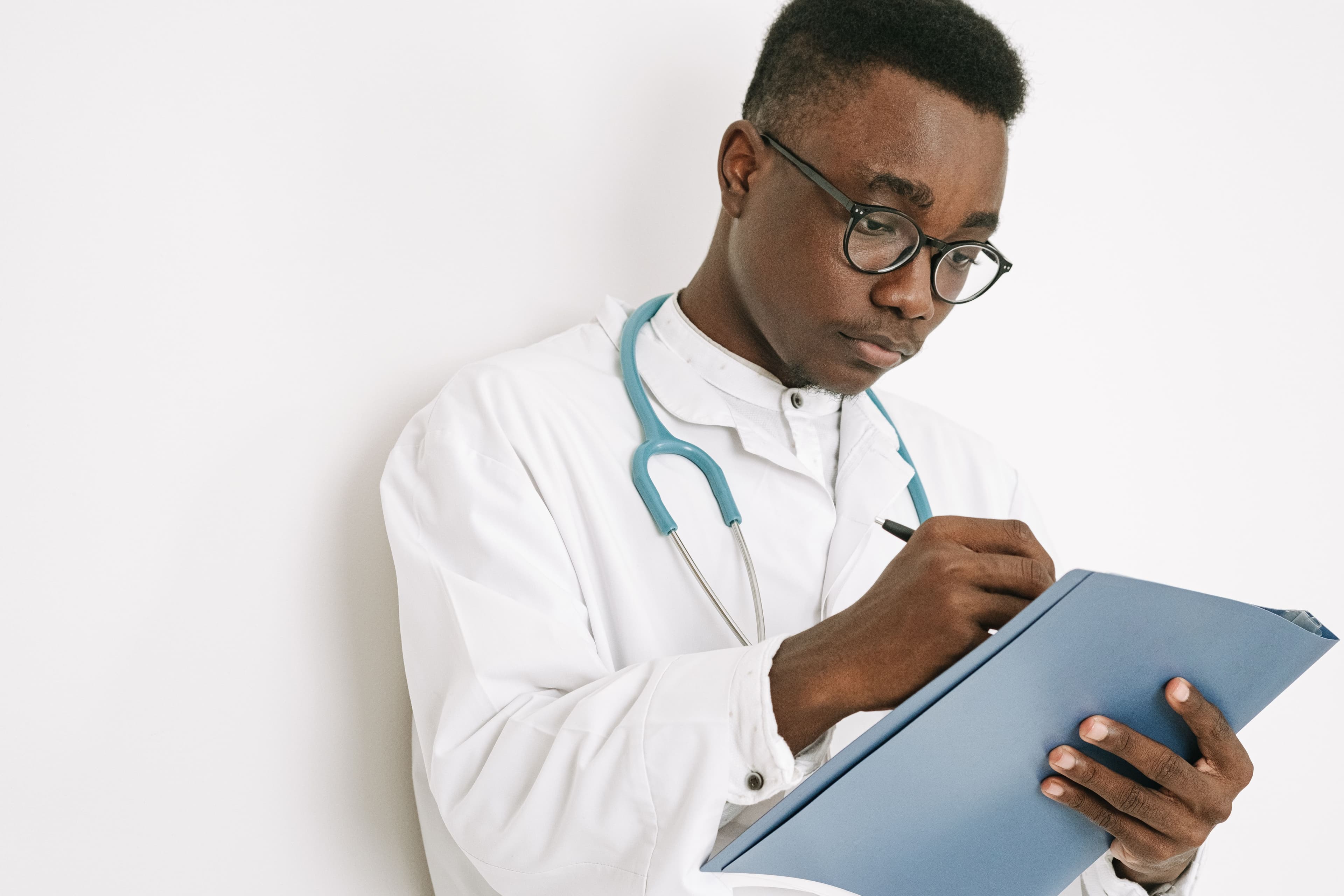 A physician reviewing patient education notes